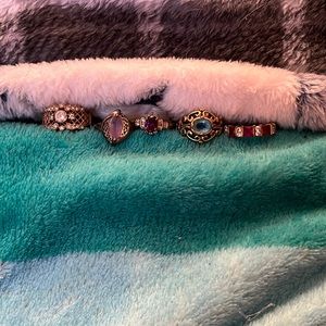 5 rings all same size gold I think they are real gold